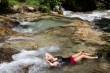 Woman relaxing at Dunn's River Falls